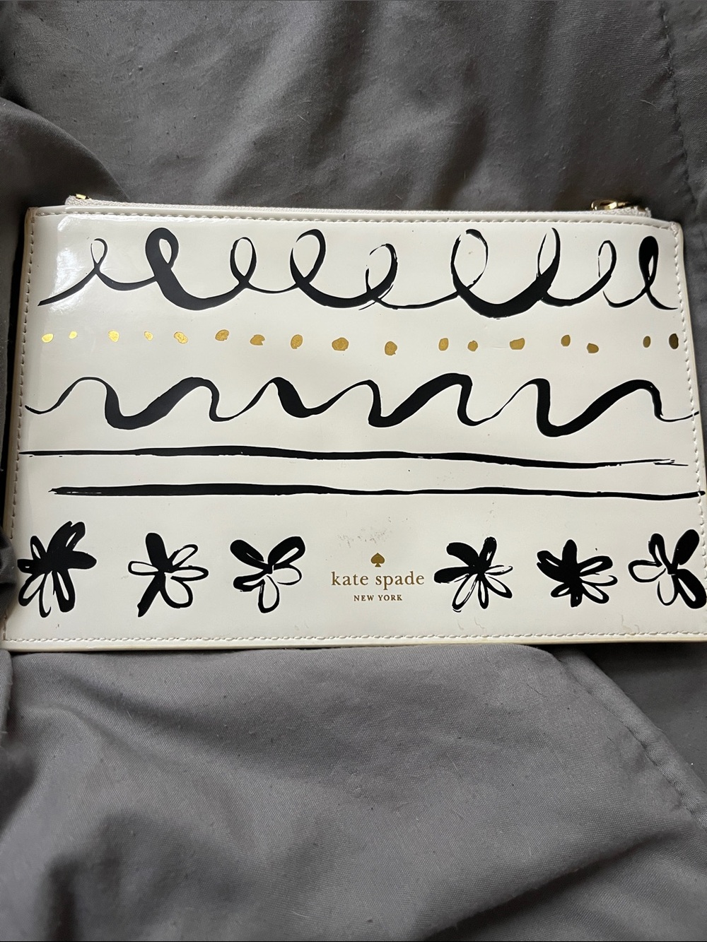 kate spade White Patent Scribble Floral Wristlet with Gold Accents
